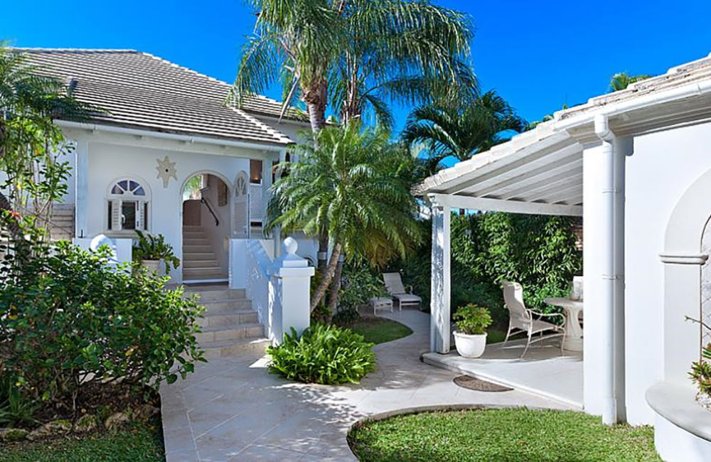 luxury 3-bed golf club villa in Barbados for sale with cottage, car and golf cart